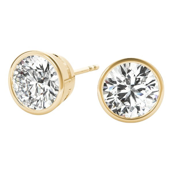 0.30 Ct Round FG/VVS1 Diamond Bezel Set Stud Earrings in 14K Yellow Gold