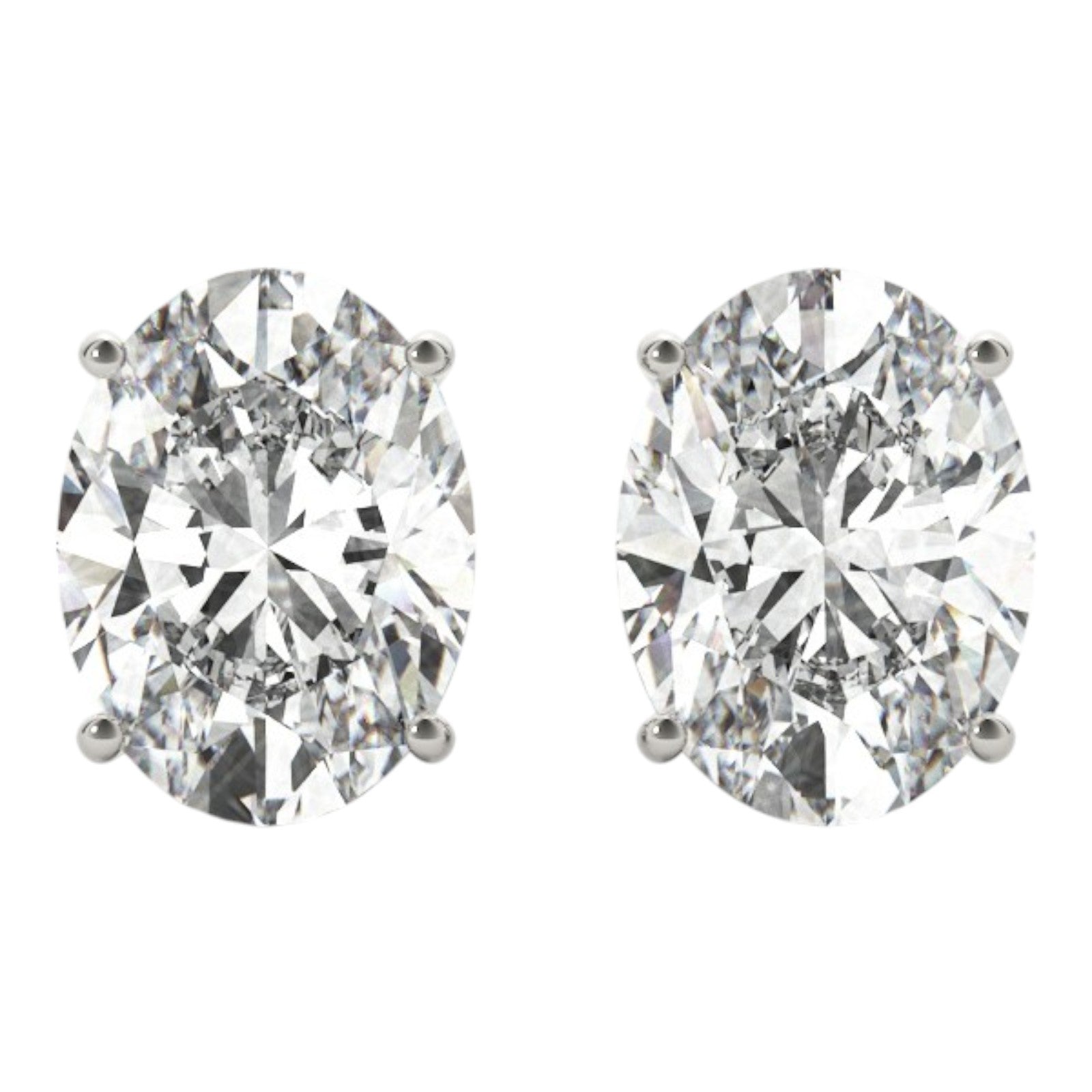 0.20 Carat Oval FG/VVS1 Diamond Stud Earrings In 14K White & Yellow Gold