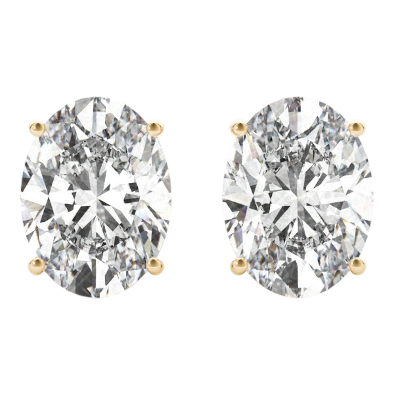 0.20 Carat Oval FG/VVS1 Diamond Stud Earrings In 14K White & Yellow Gold